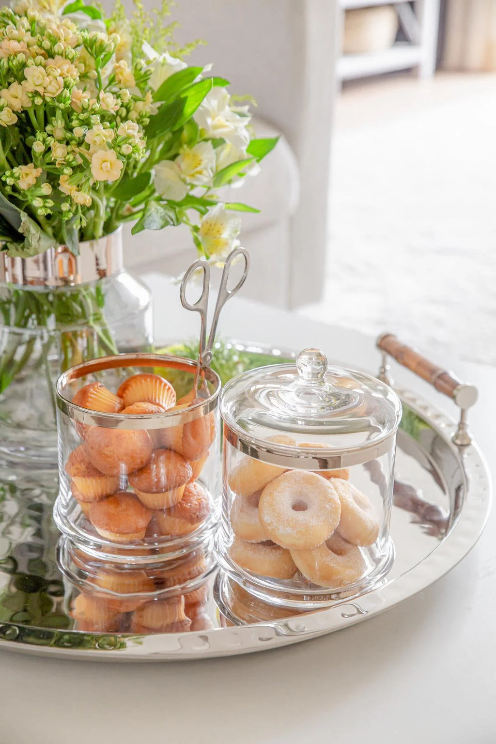 Jam jar with coaster and spoon