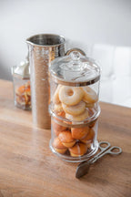 Jam jar with coaster and spoon