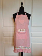 Children's apron with piglets – pink striped