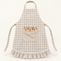 Children's apron with little geese – beige plaid