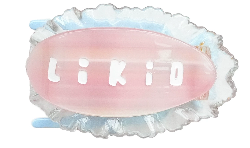 Platte Likio haarklem Pastel Veil in zacht roze met kanten rand, vooraanzicht