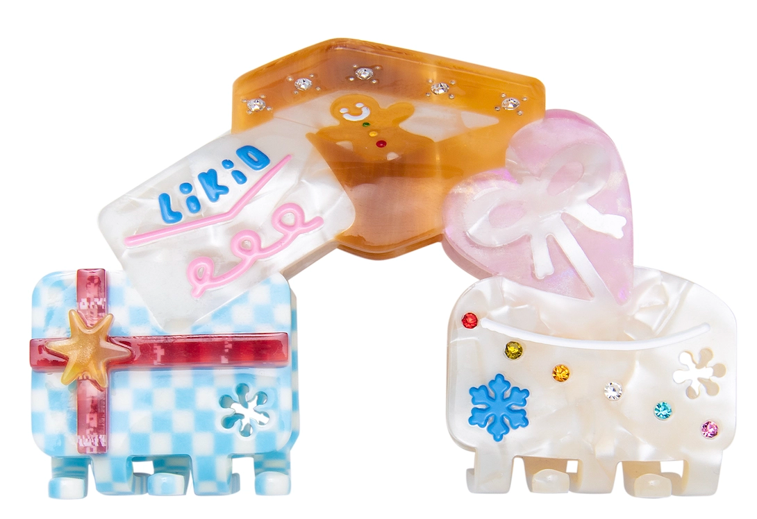 Likio Happy Gingerbread mini hair claws shaped like gifts, front view